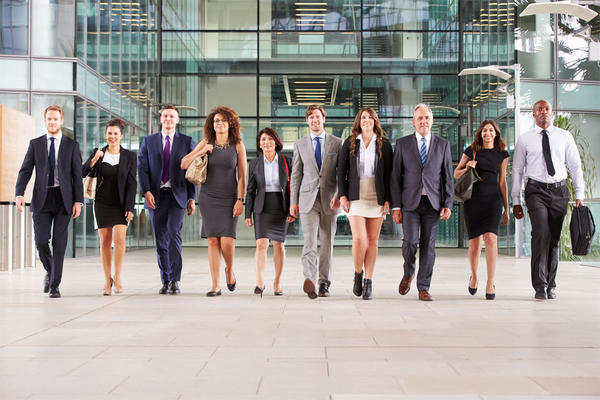 Large group of business people in lobby of a big business