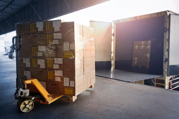 Truck Parked Loading at Dock Warehouse.